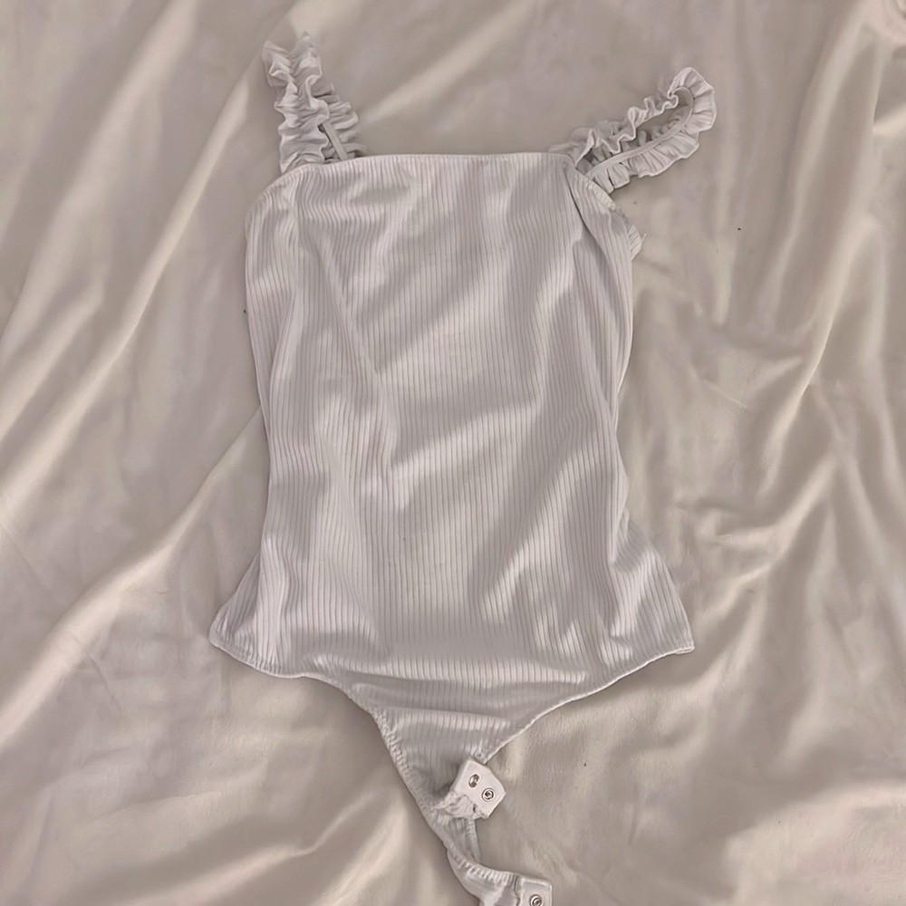 Size: S White Body Suit from Saints, never worn out just don’t like the straps